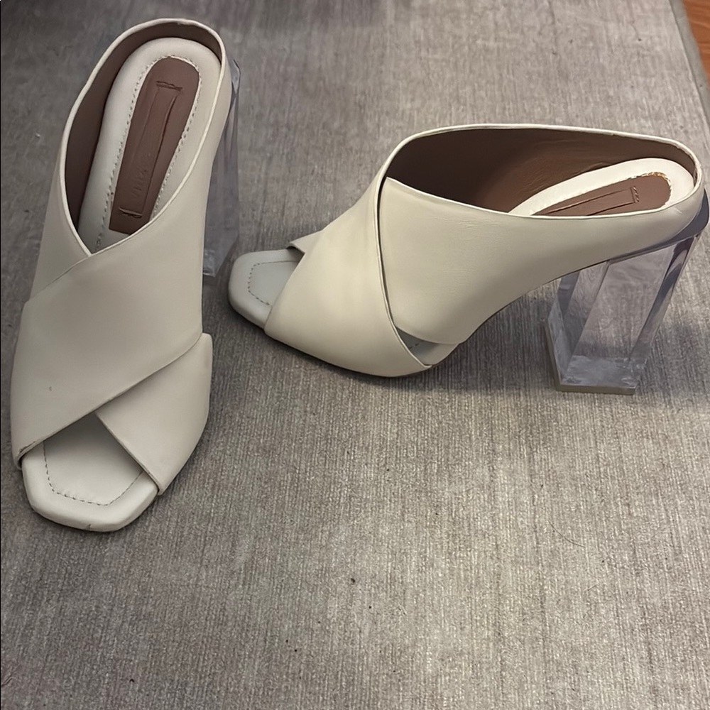 BCBGMaxAzria Cream Mules with Lucite Heel